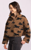 Side view of Spirit Jacket showing cropped hem and rustic horse jacquard print