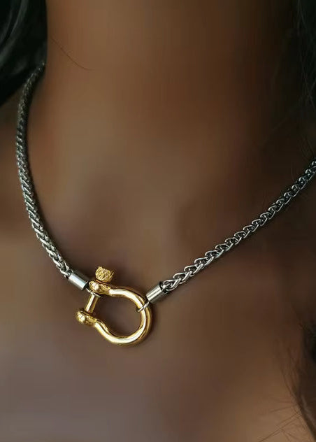 Two tone stainless steel carabiner necklace front view on model Lemonberry Aurora