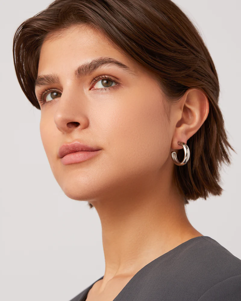 Jenny Bird Staple Hoops in silver — studio portrait, Lemonberry Aurora look