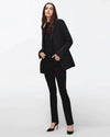 Model wearing straight leg black jeans with jacket, styled at Lemonberry in Aurora