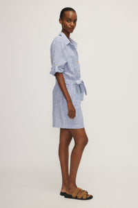 Side view of Sury Linen Romper by Melissa Nepton on mannequin at Lemonberry Aurora