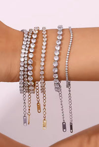 Stacked stainless steel tennis bracelets with adjustable extender chains in gold and silver Lemonberry Aurora