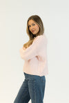 Side profile showing slouchy fit of the Pink Tulle version with jeans.