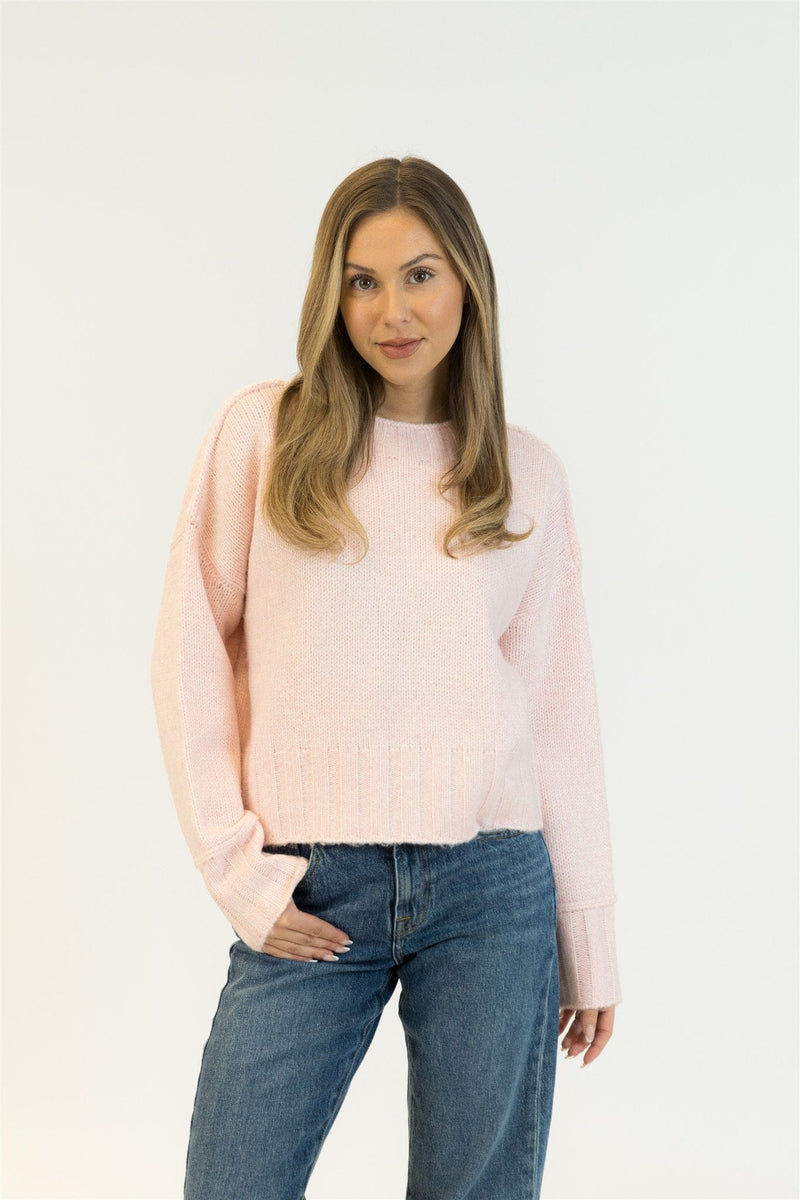 Model wearing Lyla + Luxe TIMMY sweater in Pink Tulle, full front view, casual styling.