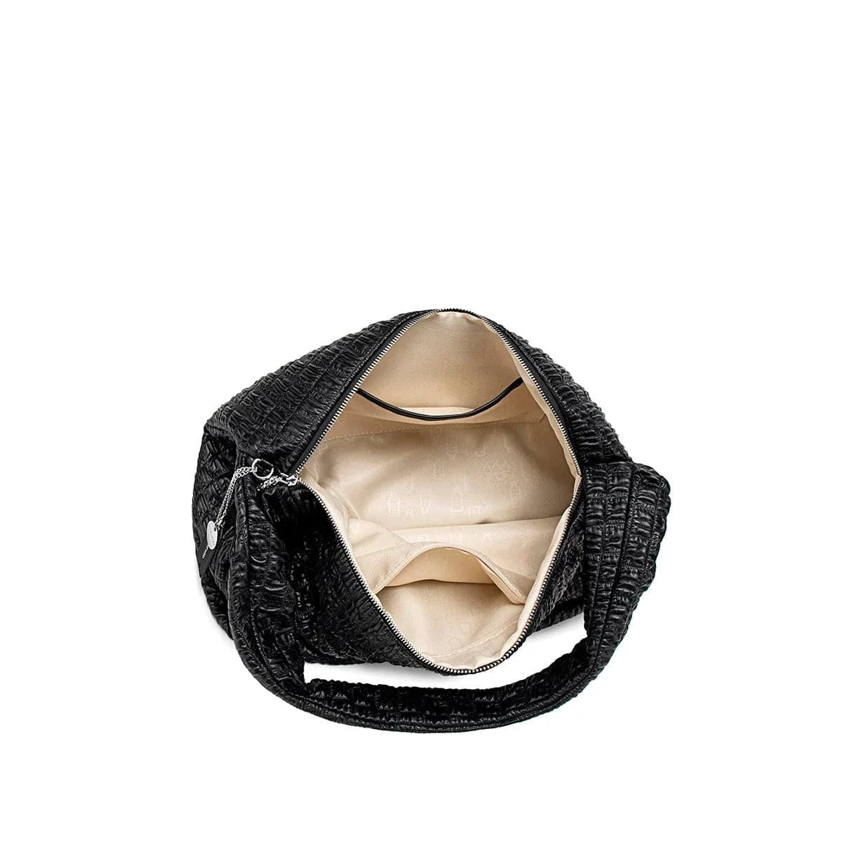 Open black vegan handbag by Pixie Mood, showcasing the interior with slip and zip pockets for organization.