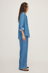 Side view of a model wearing the Yoko blouse by Melissa Nepton, available at Lemonberry in Aurora, ON.