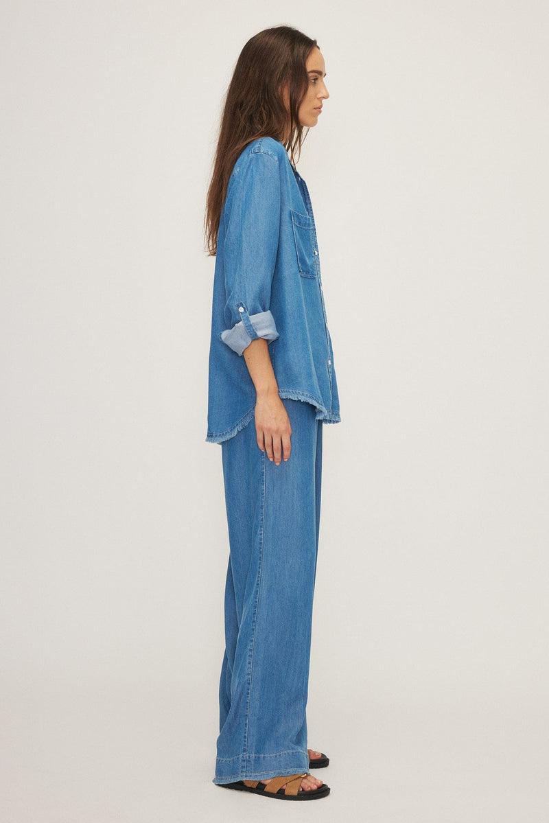 Side view of a model wearing the Yoko blouse by Melissa Nepton, available at Lemonberry in Aurora, ON.