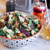 Close-up of a gourmet salad from Mandy’s Gourmet Cookbook, featuring an array of fresh ingredients and vibrant colors.