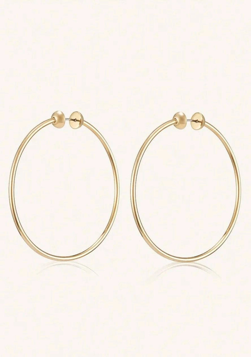 Jenny Bird Icon Hoops in high-polish gold, featuring a sleek 360-degree full-circle design.